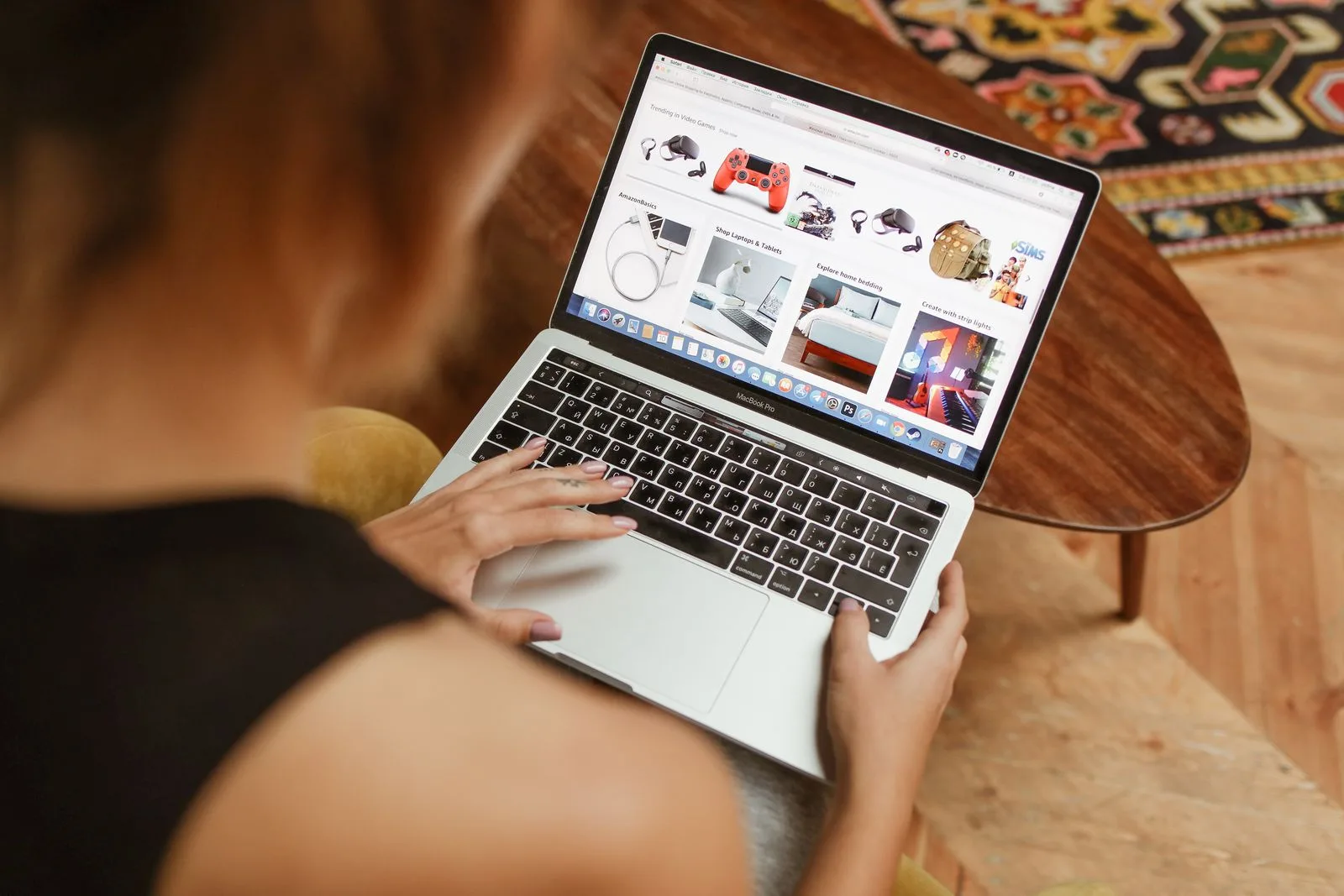 A person browsing a game storefront on a laptop screen