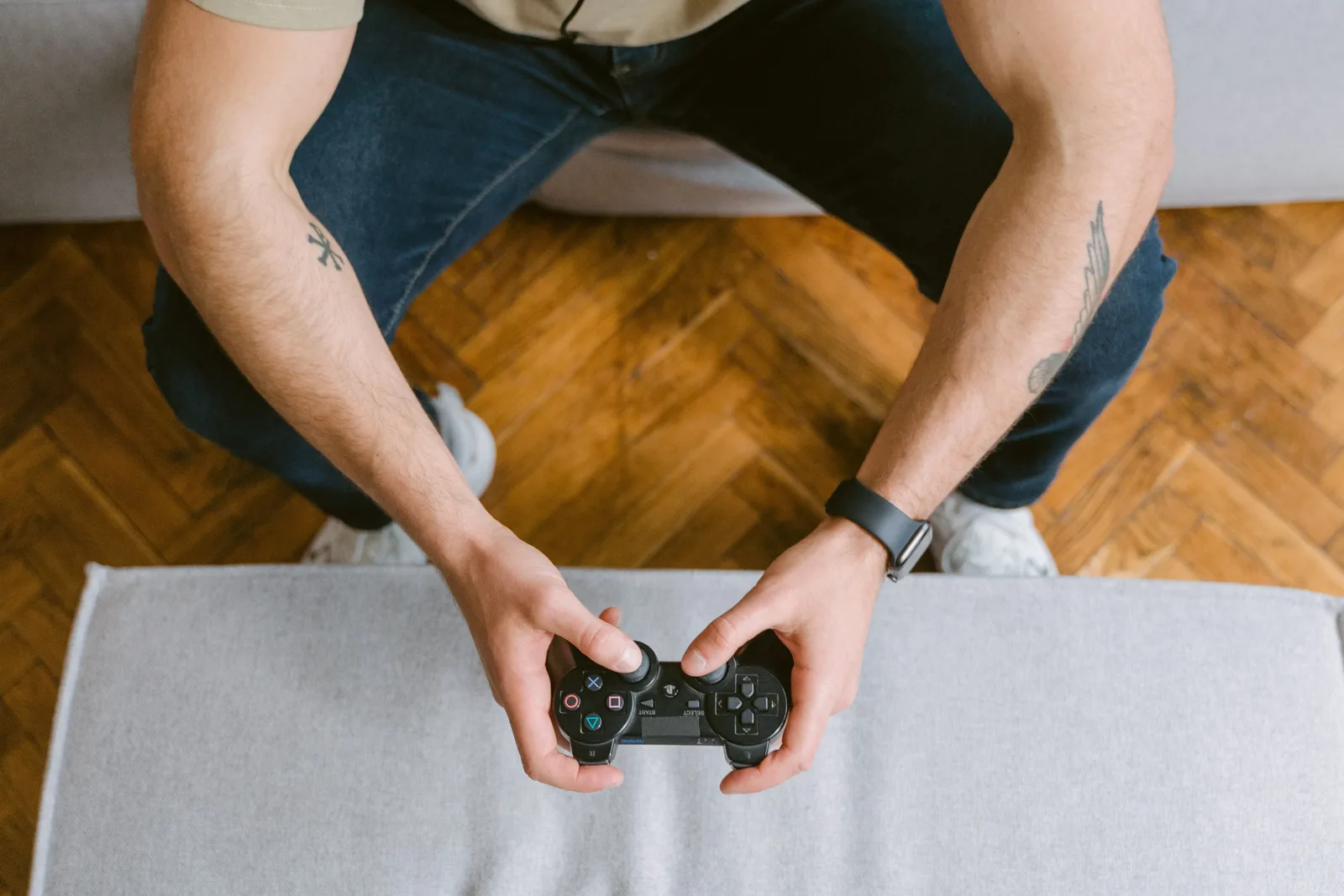Someone holding a game controller during a gameplay session