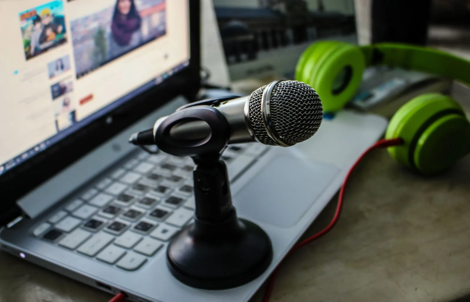 A streaming setup with a microphone and laptop